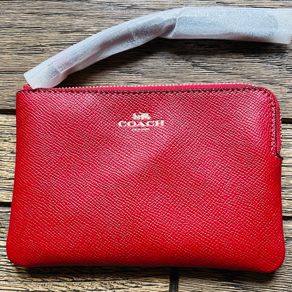 NWOT Authentic Coach wristlet.